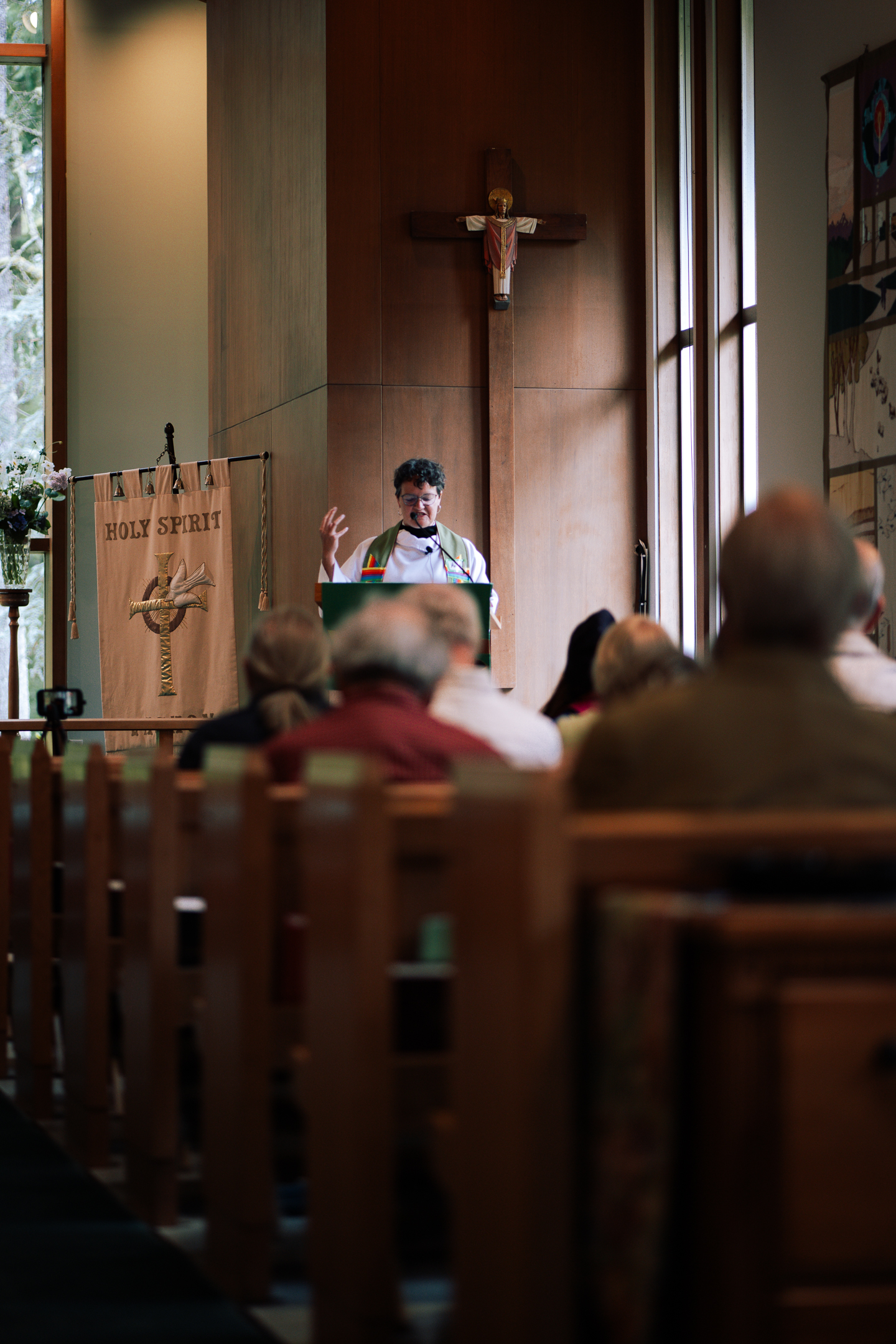 The rector preaching from the pulpit during a Sunday service